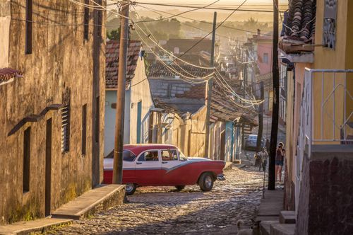 street-old-american-car-cuba-shutterstock_579862594